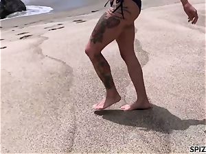 Anna Bell Peaks porking a giant beef whistle on the beach
